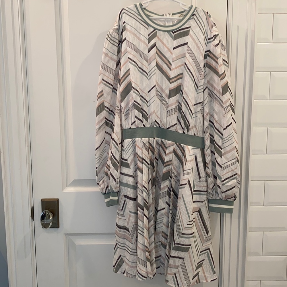 Brand new dress. Never worn before. Knee length.